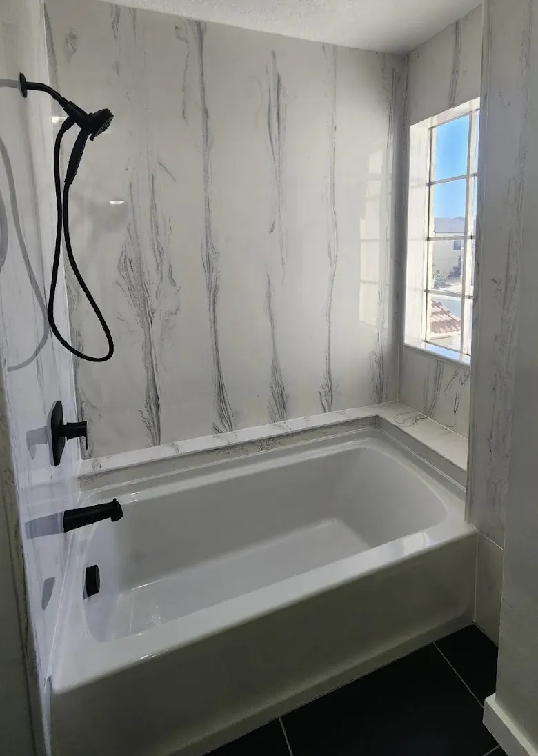 Remodeled bathroom with new tub surround